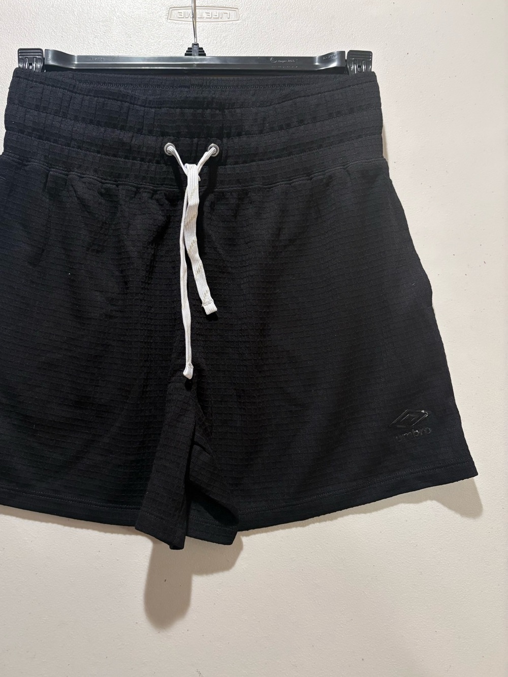 Umbro loose knit waffle shorts in black in medium